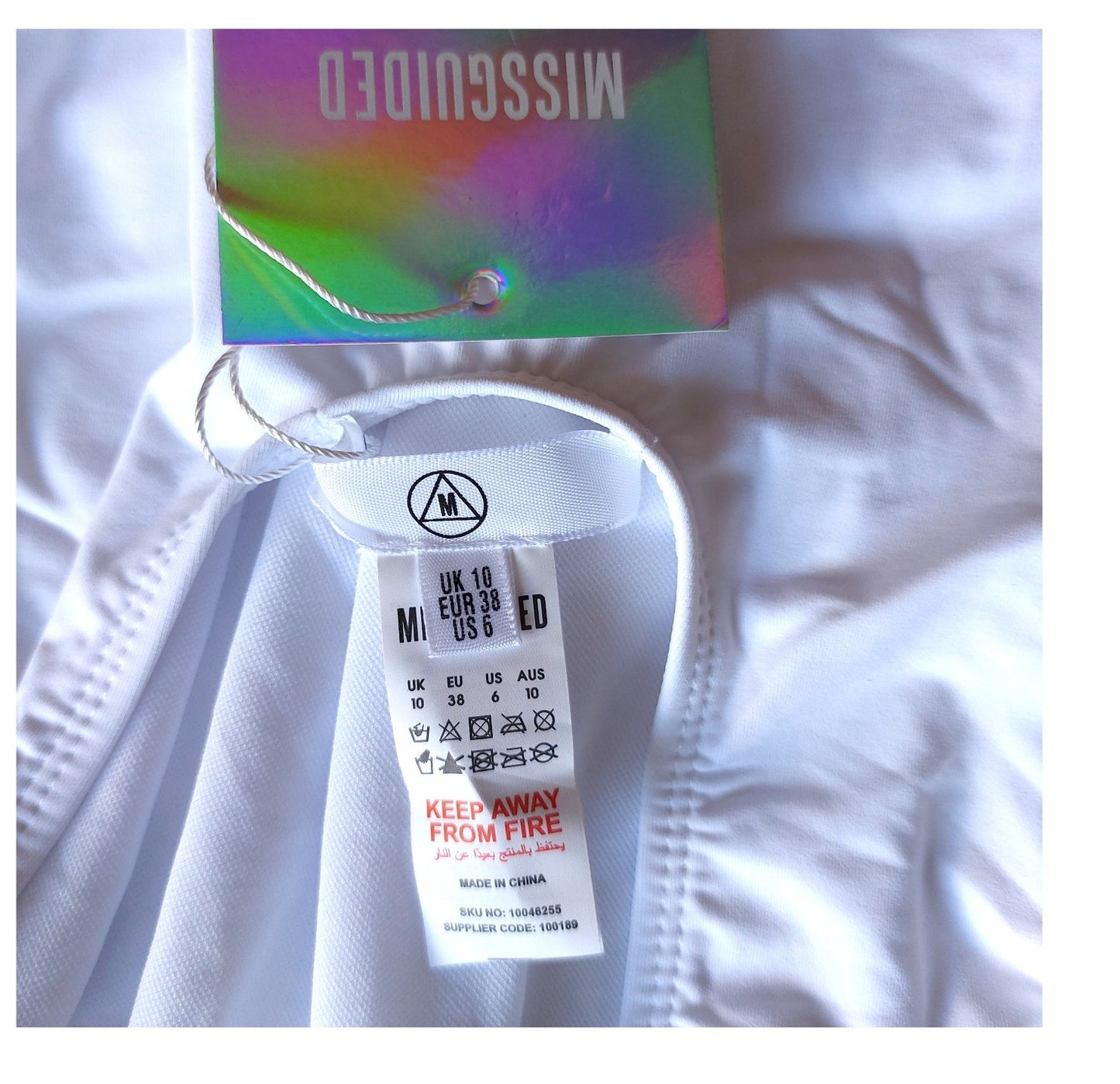 ,,Missguided" vientisas maudymosi kostiumėlis (M dydis).
