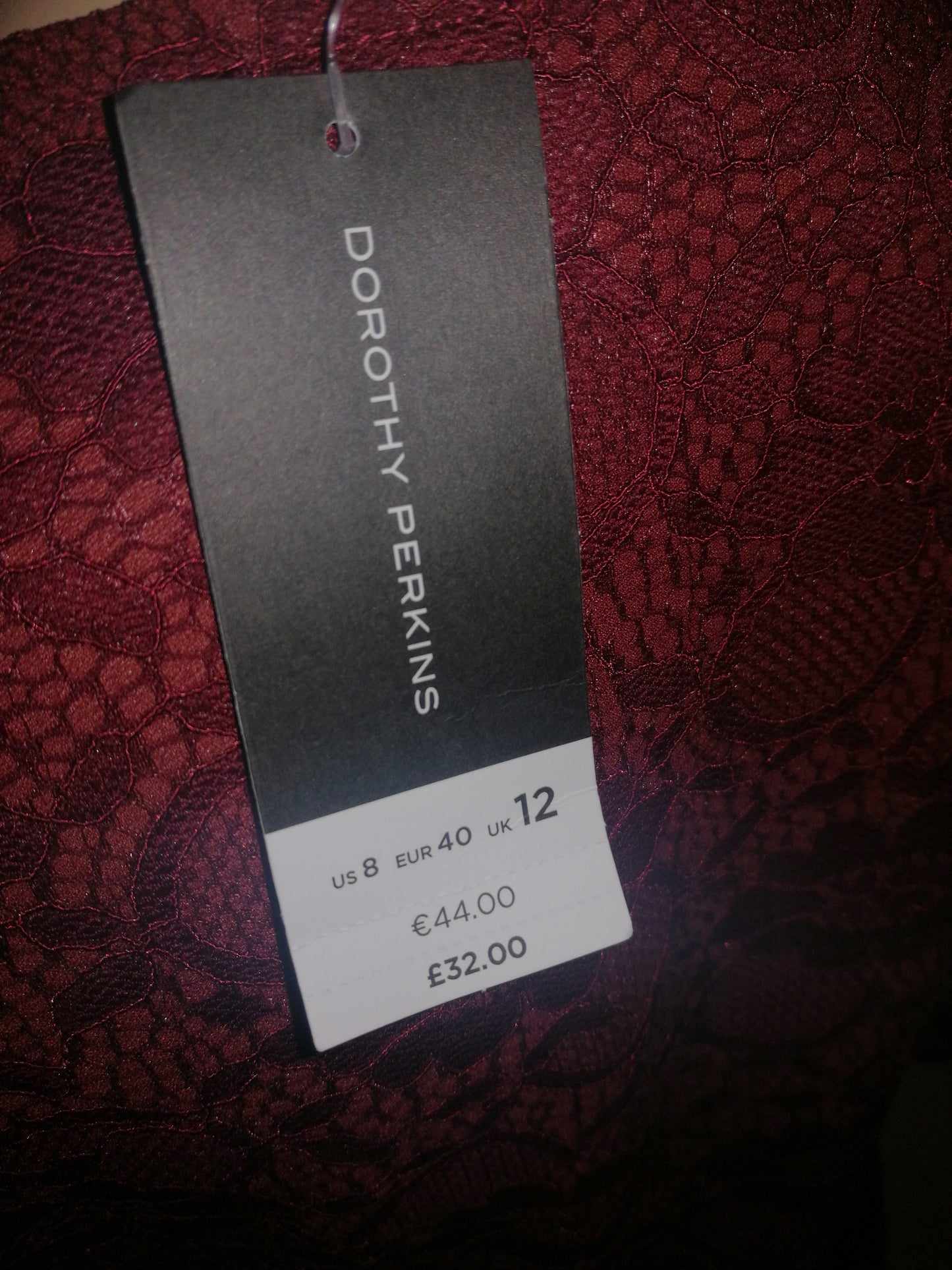 ,,DOROTHY PERKINS" puošni gipiūro audinio suknutė (40 dydis).