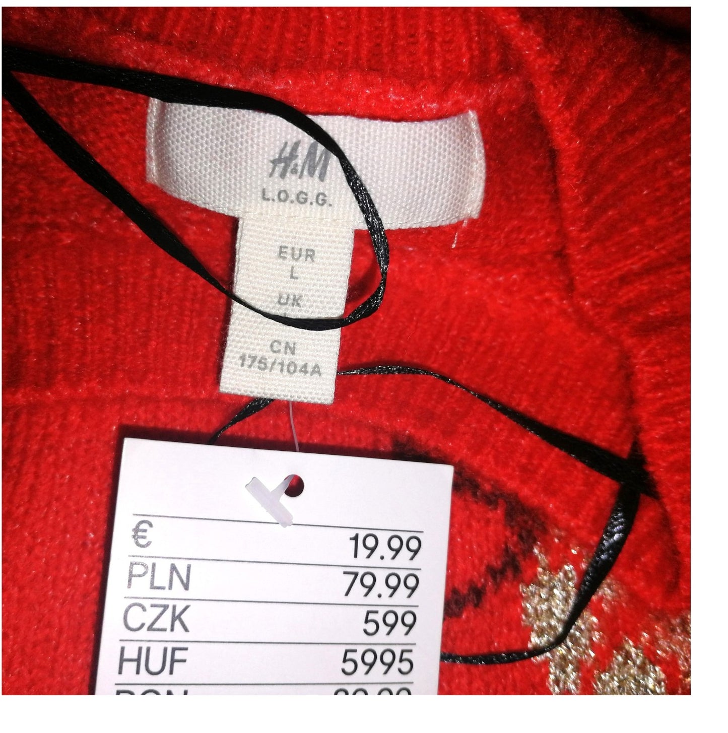 ,,H&M" kalėdinis megztukas su blizgiu.